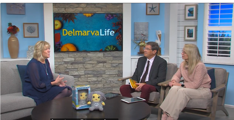 Patricia A. Woods on the DelmarvaLife set with the Hope doll